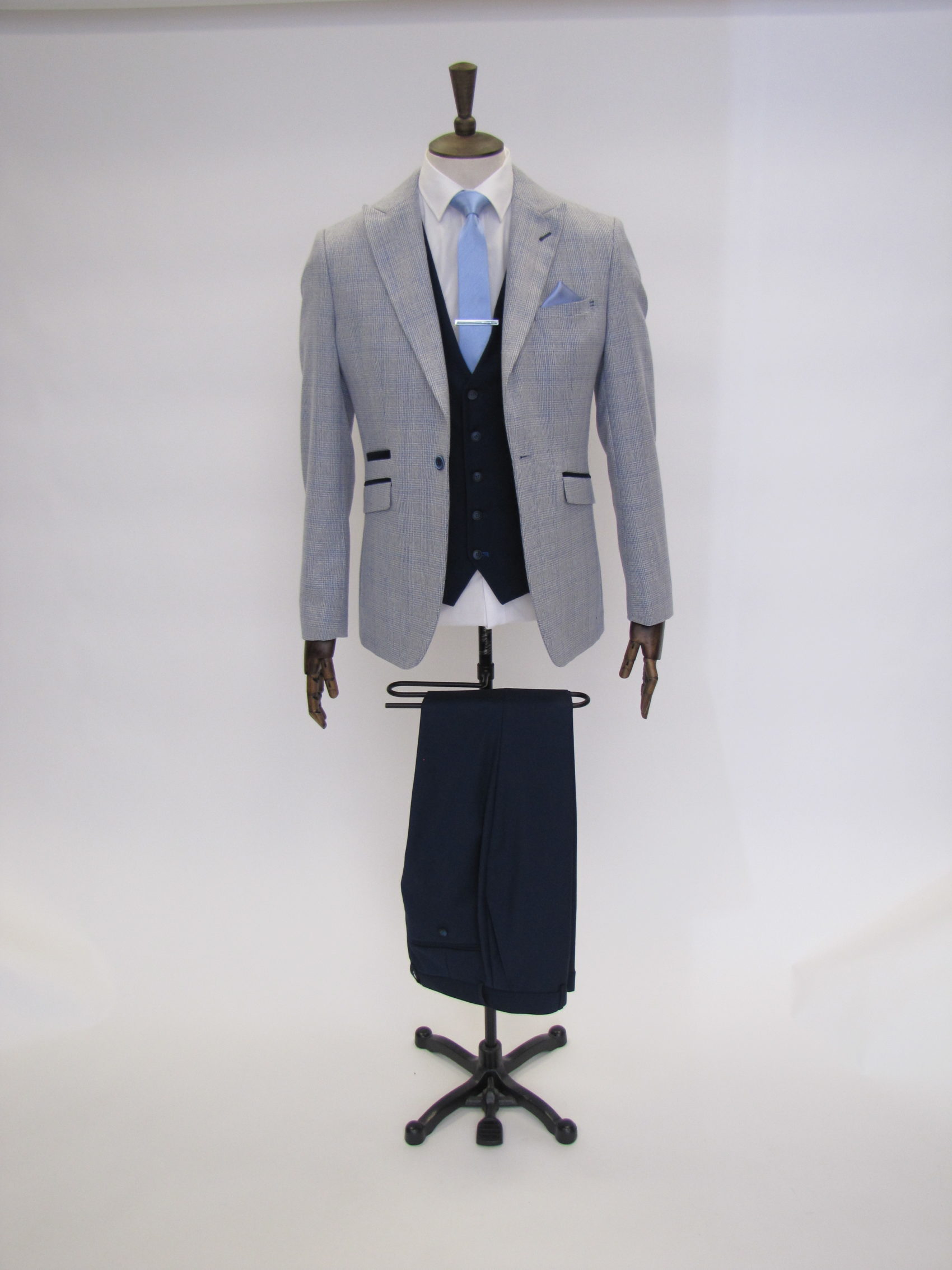 Blue Morning dress with grey waistcoat and blue Trousers with pocket square